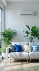 The image shows a modern, minimalist living room with a white sofa placed against a plain white wall