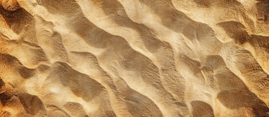 Top view of a sandy texture with ample copy space image.