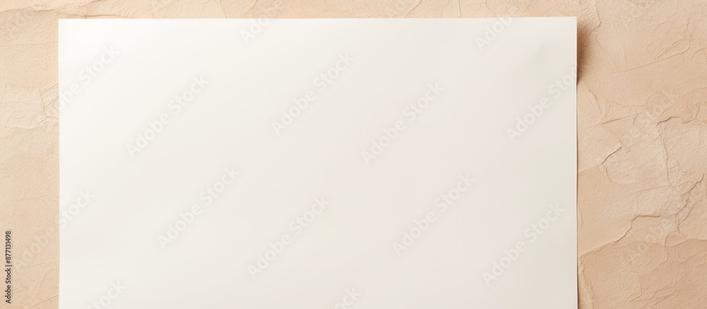 Leinwandbilder overhead view of a blank white paper on a beige background with copy space image.