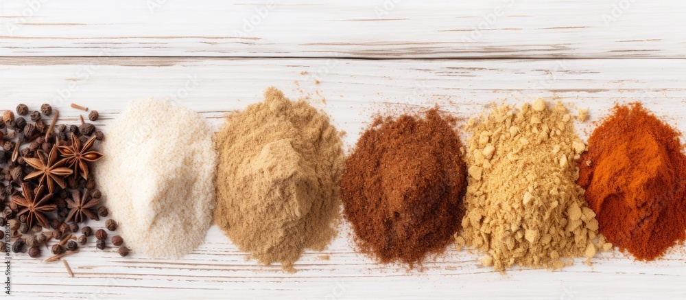 Poster Close-up view of powdered spices on a white wooden surface with ample copy space for text or images.