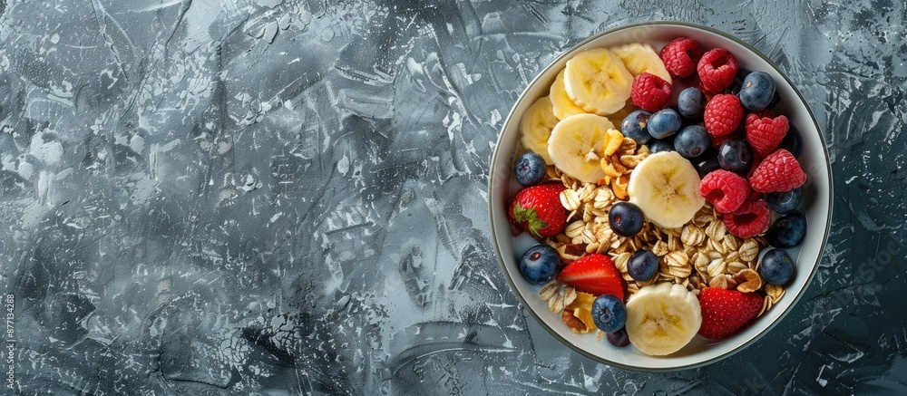 Poster a top view of a nutritious breakfast displayed on a grey backdrop, highlighting the combination of t
