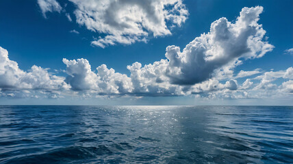 Obraz premium a beautiful blue sea background, blue sea, sea background, sea with white cloud, nature background, water of sea