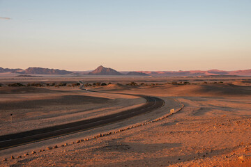 sunrise over sossusvlei national park, namibia