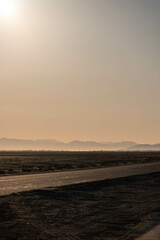 Obraz premium road in the desert at sunset, namibia, africa