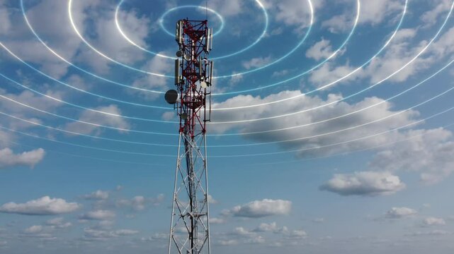 Mobile telecommunication cell tower with transmit telecommunication signal. 4G 5G mobile network. Telecommunication tower against a blue sky with clouds transmitting a luminous signal around it. 4k. - Powered by Adobe
