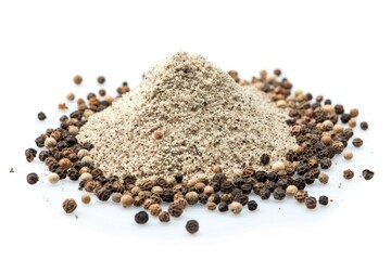 A mound of sand with pepper seeds scattered on top, on a clean white surface