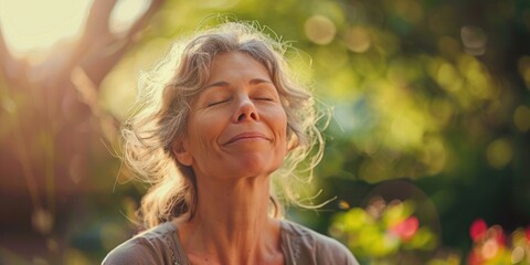 A woman looks up with her eyes closed, possibly in contemplation or meditation