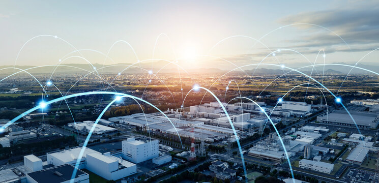 Modern factory and communication network concept. Industrial Internet of Things. IIoT. Wide angle visual for banners or advertisements.