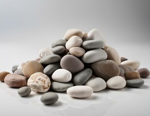 A pile of rocks and gravel on a clean white surface, suitable for use in backgrounds or textures 