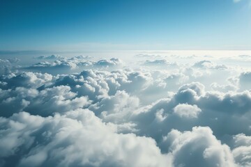 Aerial photography of fluffy cloudscape with sunlight creating a serene and ethereal atmosphere