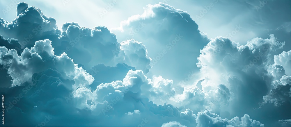 Poster storm clouds creating a dramatic backdrop in a blue sky with copy space image