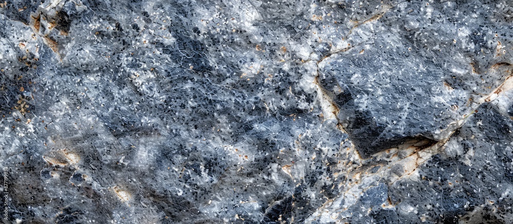 Poster close up image showing the texture of gray granite with copy space
