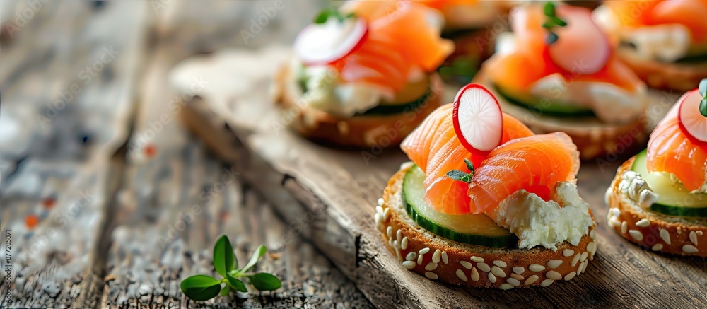 Aufkleber Delicious salmon cucumber radish and cream cheese canapes displayed on a wooden table with ample copy space image