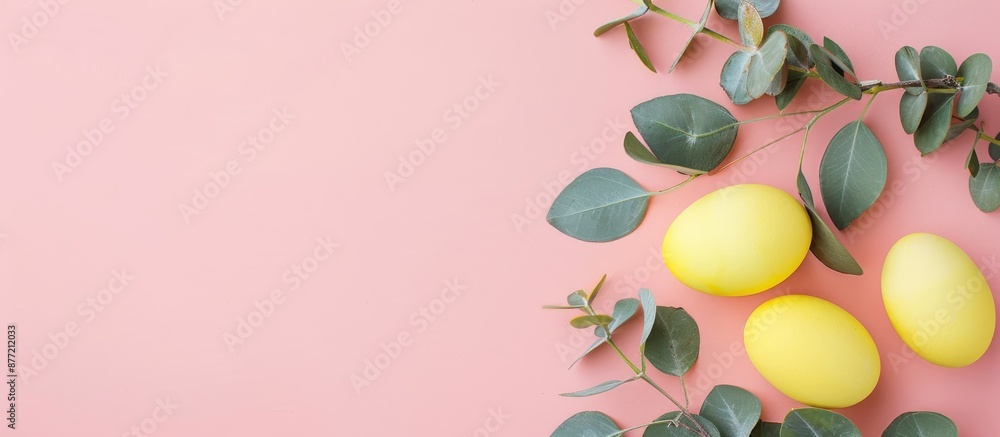 Aufkleber easter theme featuring yellow eggs eucalyptus branch on a pastel pink backdrop perfect for a flat la