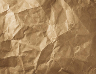 Fototapeta premium Brown crumpled paper as a background. Close-up.