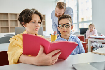 kids reading a book in a lively classroom, engrossed in storytelling and fostering a love for reading.