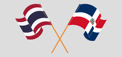 Crossed and waving flags of Thailand and Dominican Republic