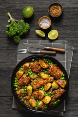 Chicken Vesuvio in a baking dish, top view