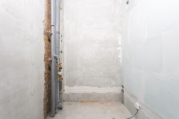 interior of the apartment without decoration in gray colors. rough finish