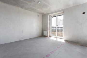 interior of the apartment without decoration in gray colors. rough finish