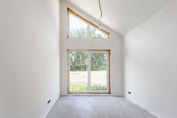 interior of the apartment without decoration in gray colors. rough finish