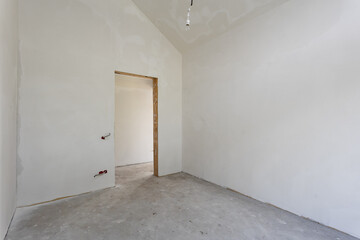interior of the apartment without decoration in gray colors. rough finish
