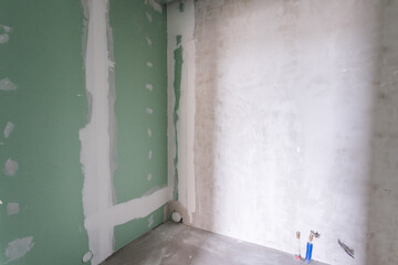 interior of the apartment without decoration in gray colors. rough finish