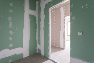 interior of the apartment without decoration in gray colors. rough finish