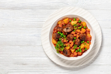 turkish meatball stew, sulu kofte, in a bowl