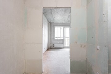 interior of the apartment without decoration in gray colors. rough finish