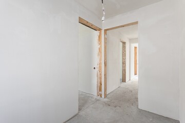 interior of the apartment without decoration in gray colors. rough finish