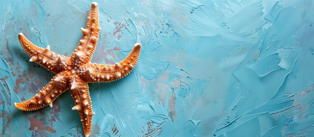 Poster starfish on a serene blue background with ample copy space image