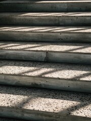 A man riding a skateboard down some concrete steps, AI