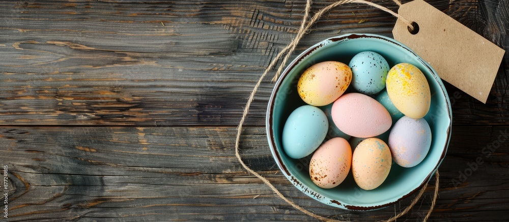 Poster happy easter card featuring a bowl of brightly colored pastel easter eggs on a wooden background wit