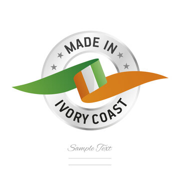 Made in Ivory Coast. C&ocirc;te d'Ivoire flag ribbon with circle silver ring seal stamp icon. Ivory Coast sign label vector isolated on white background