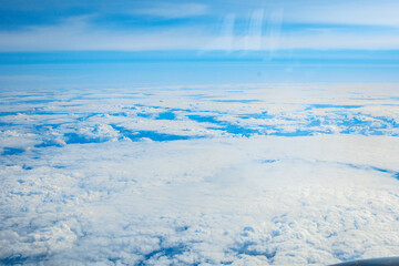 Obraz premium Paris, France - Airplane flying under blue sky