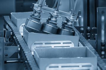 The high technology material handling process in canned food production by robotic system.