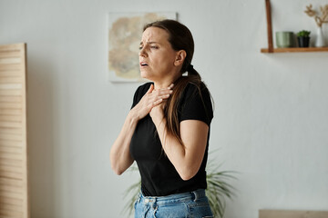 Woman in living room, struggling with depression.