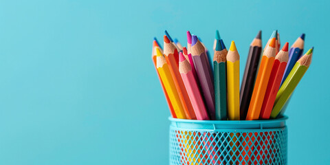 Fototapeta premium Colorful pencil stand with a set of pencils for drawing at school, promoting creativity in arts and crafts, art education concept