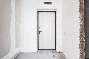 interior of the apartment without decoration in gray colors. rough finish