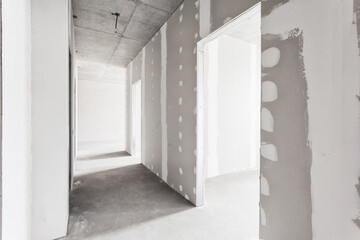 interior of the apartment without decoration in gray colors. rough finish