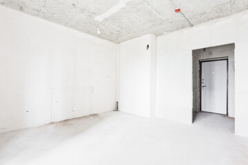 interior of the apartment without decoration in gray colors. rough finish