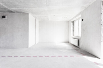 interior of the apartment without decoration in gray colors. rough finish
