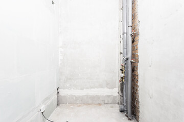 interior of the apartment without decoration in gray colors. rough finish