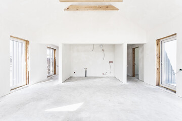 interior of the apartment without decoration in gray colors. rough finish