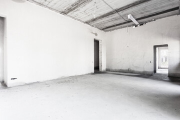 interior of the apartment without decoration in gray colors. rough finish