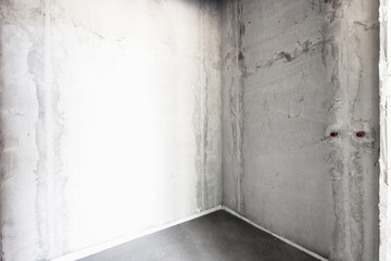 interior of the apartment without decoration in gray colors. rough finish