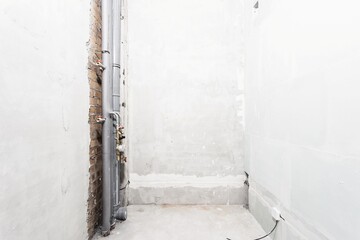 interior of the apartment without decoration in gray colors. rough finish