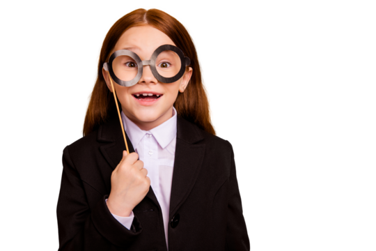 Portrait of her she nice attractive cute lovely cheery cheerful childish playful pre-teen girl wearing formal jacket blazer holding fake glasses isolated over beige pastel background