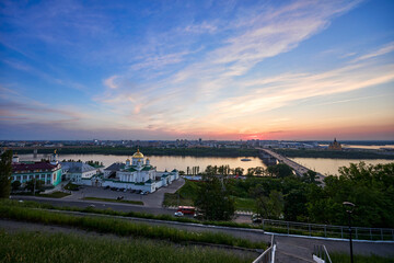 Fototapeta premium Evening view of Annunciation Monastery, Kanavinsky Bridge and Alexander Nevsky Cathedrall, Nizhny Novgorod, Russia
